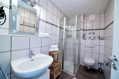Ein Badezimmer in der Unterkunft Haus Nordseebrandung NB16