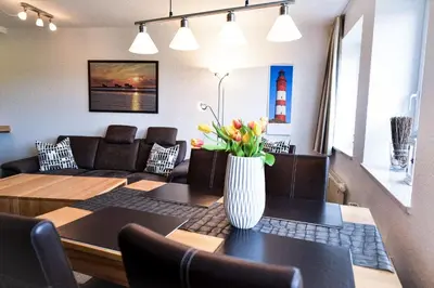 Ein Sitzbereich in der Unterkunft Haus Nordseebrandung NB42