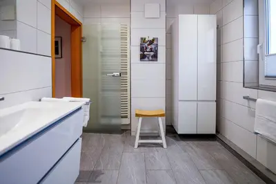 Ein Badezimmer in der Unterkunft Haus Nordseebrandung NA71