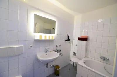 Ein Badezimmer in der Unterkunft Haus Nordseebrandung NB51