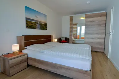 Ein Bett oder Betten in einem Zimmer der Unterkunft Haus Nordseebrandung ND12