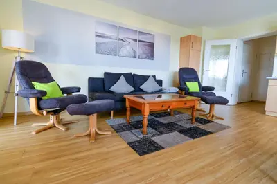 Ein Sitzbereich in der Unterkunft Haus Nordseebrandung ND44