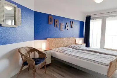 Ein Bett oder Betten in einem Zimmer der Unterkunft Haus Nordseebrandung ND53