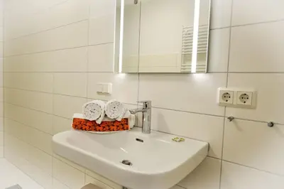 Ein Badezimmer in der Unterkunft Haus Nordseebrandung ND63