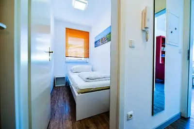Ein Bett oder Betten in einem Zimmer der Unterkunft Haus Seewind HS18