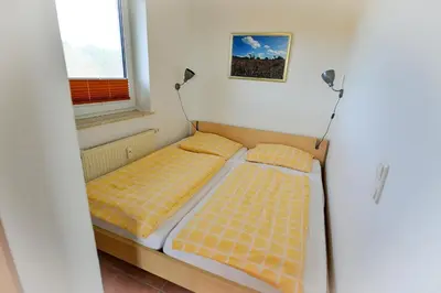 Ein Bett oder Betten in einem Zimmer der Unterkunft Haus Seewind HS22