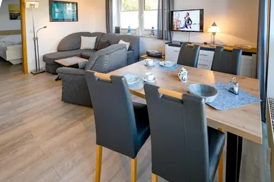 Ein Sitzbereich in der Unterkunft Haus Seewind HS01