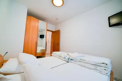 Ein Bett oder Betten in einem Zimmer der Unterkunft Haus Seewind HS08