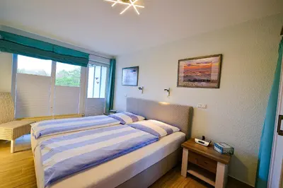 Ein Bett oder Betten in einem Zimmer der Unterkunft Haus Nordseebrandung NC34