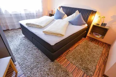 Ein Bett oder Betten in einem Zimmer der Unterkunft Flockengrund HB03