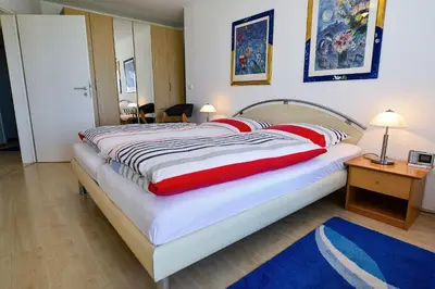 Ein Bett oder Betten in einem Zimmer der Unterkunft Haus Nordseebrandung NC53