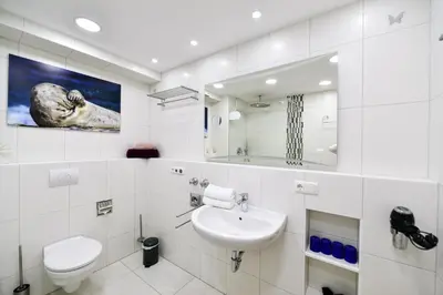 Ein Badezimmer in der Unterkunft Haus Nordseebrandung NC64