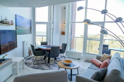 Ein Sitzbereich in der Unterkunft Haus Nordseebrandung NC73