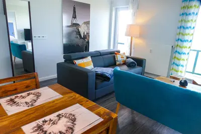 Ein Sitzbereich in der Unterkunft Beach Lodge BL08
