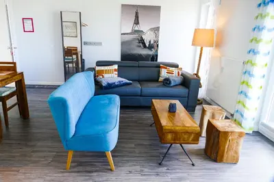 Ein Sitzbereich in der Unterkunft Beach Lodge BL08