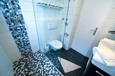 Ein Badezimmer in der Unterkunft Strandhochhaus SJ13