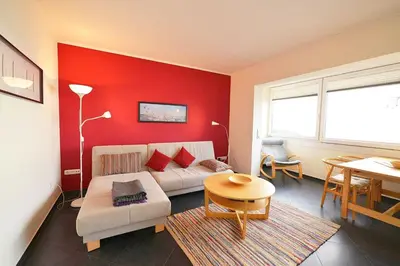 Ein Bett oder Betten in einem Zimmer der Unterkunft Strandhochhaus SD12