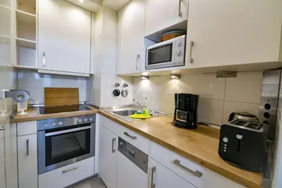 Küche/Küchenzeile in der Unterkunft Strandhochhaus SG03