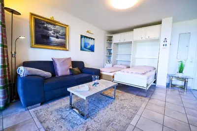 Ein Bett oder Betten in einem Zimmer der Unterkunft Haus Horizont H14A