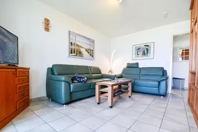 Ein Sitzbereich in der Unterkunft Haus Horizont H14B