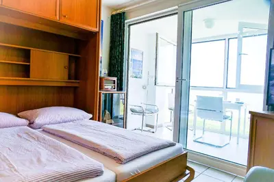 Ein Bett oder Betten in einem Zimmer der Unterkunft Haus Horizont H14B