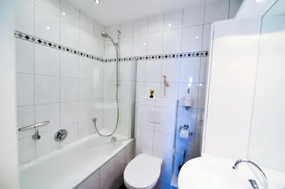 Ein Badezimmer in der Unterkunft Strandhochhaus SHF3