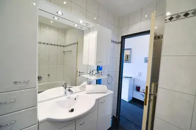 Ein Badezimmer in der Unterkunft Strandhochhaus SHF3