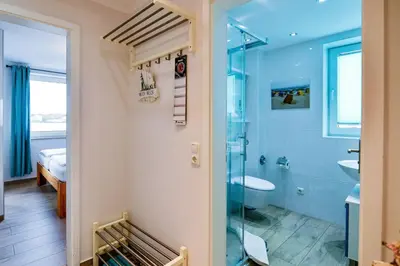 Ein Badezimmer in der Unterkunft Haus Horizont HZ07