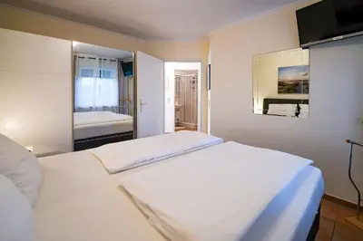 Ein Bett oder Betten in einem Zimmer der Unterkunft Flockengrund V15U