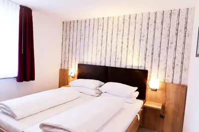 Ein Bett oder Betten in einem Zimmer der Unterkunft Haus Horizont HZ19