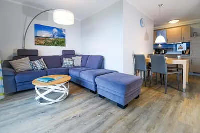 Ein Sitzbereich in der Unterkunft Beach Lodge BL01