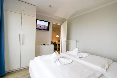 Ein Bett oder Betten in einem Zimmer der Unterkunft Beach Lodge BL01