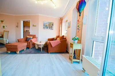 Ein Sitzbereich in der Unterkunft Haus Nordseebrandung NB53