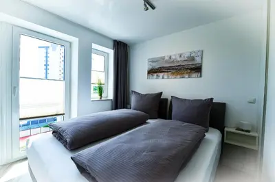 Ein Sitzbereich in der Unterkunft Haus Nordseebrandung NA55