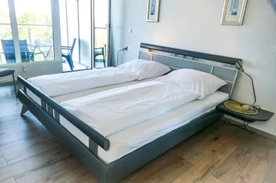 Ein Bett oder Betten in einem Zimmer der Unterkunft Haus Nordseebrandung NC54