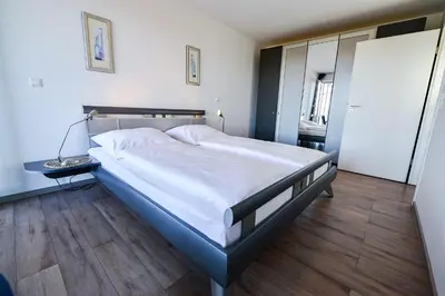 Ein Bett oder Betten in einem Zimmer der Unterkunft Haus Nordseebrandung NC54