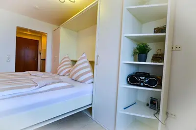 Ein Bett oder Betten in einem Zimmer der Unterkunft Haus Horizont HZ05