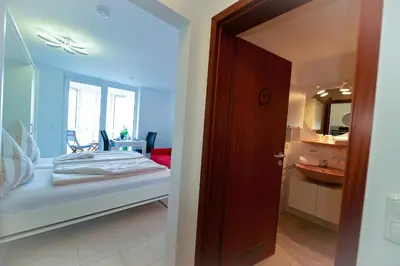 Ein Bett oder Betten in einem Zimmer der Unterkunft Haus Horizont HZ05