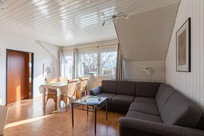 Ein Sitzbereich in der Unterkunft Haus Windböe, Wohnung 5