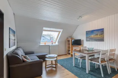 Ein Sitzbereich in der Unterkunft Haus Windböe, Wohnung 8