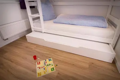 Ein Bett oder Betten in einem Zimmer der Unterkunft Dünenquartier Cuxhaven