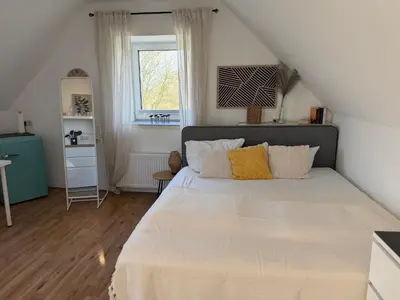 Ein Bett oder Betten in einem Zimmer der Unterkunft Deich Winde 9.1
