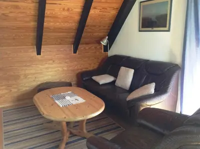 Ein Sitzbereich in der Unterkunft Fewo Hoogen in Strandnähe