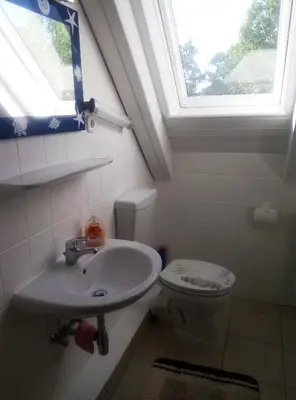 Ein Badezimmer in der Unterkunft Fewo Hoogen in Strandnähe