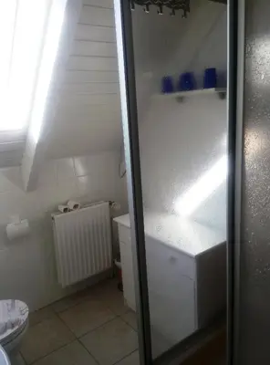Ein Badezimmer in der Unterkunft Fewo Hoogen in Strandnähe
