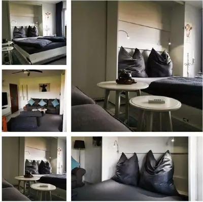 Ein Sitzbereich in der Unterkunft Deichwohnung Strandweg 7