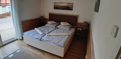 Ein Bett oder Betten in einem Zimmer der Unterkunft Deichresidenz Büsum Whg5