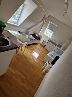 Ein Sitzbereich in der Unterkunft Monteurwohnung für 2 Personen inkl. MwSt. - DG Wohnung