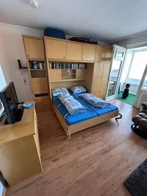 Ein Bett oder Betten in einem Zimmer der Unterkunft Gemütliches Ferien Apartment in Cuxhaven