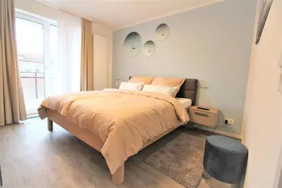 Ein Bett oder Betten in einem Zimmer der Unterkunft Residenz Passat Cuxhaven 2